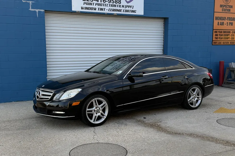 Black Mercedes-Benz coupe with ceramic window tint and a tinted windshield