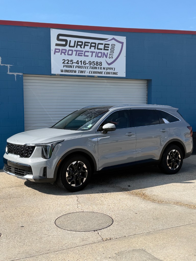 White Lexus ES with ceramic window tint at Surface Protection Studio